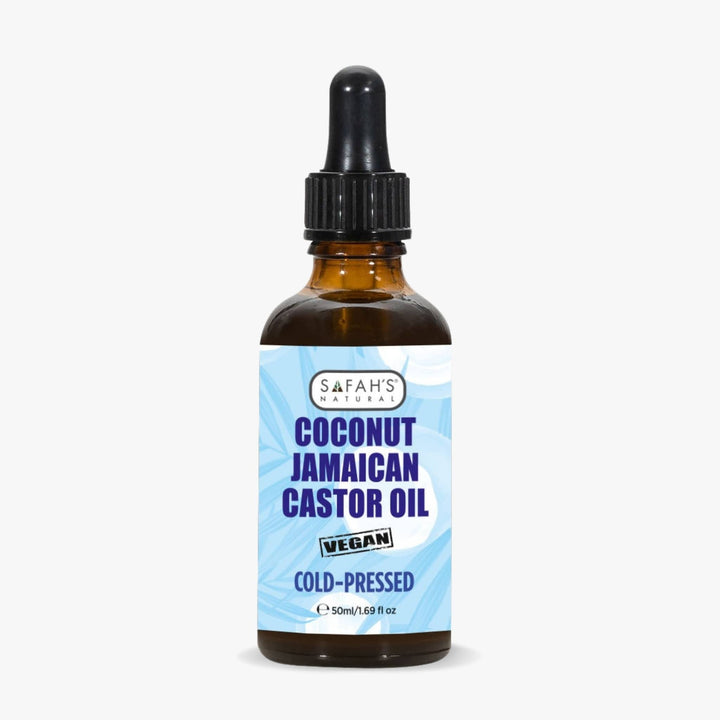 Bottle of coconut Jamaican castor oil with a blue label on a white background