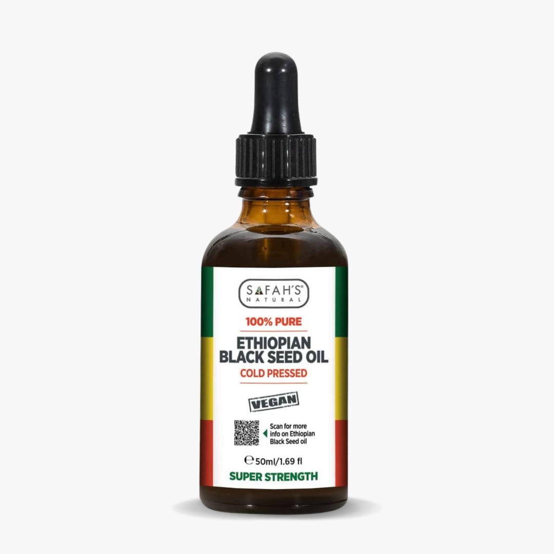 Safah's Ethiopian Black Seed Oil bottle with dropper on a white background