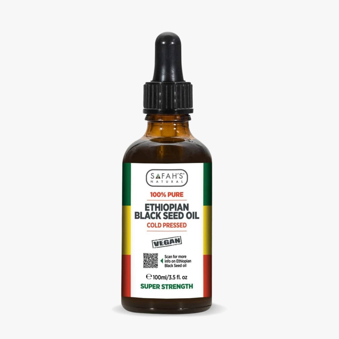 Safah's Ethiopian Black Seed Oil bottle with dropper on a white background