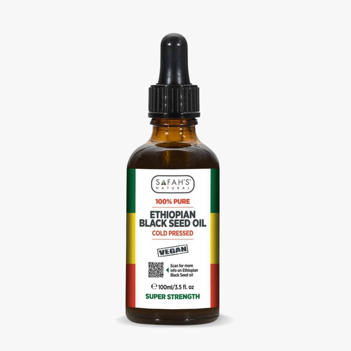 Safah's Ethiopian Black Seed Oil bottle with dropper on a white background
