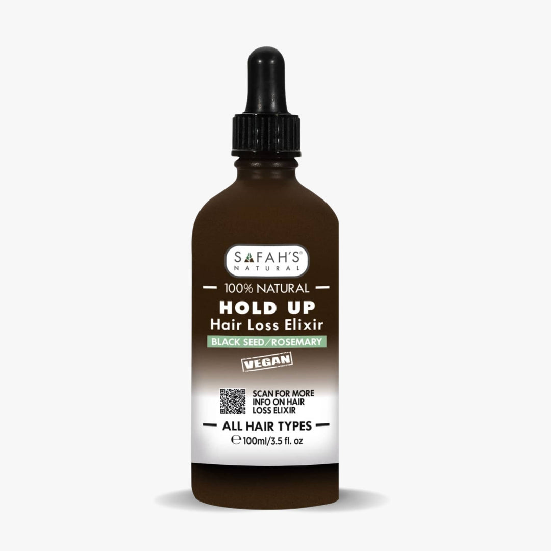 Bottle of Safah's Hold Up Hair Loss Elixir on a white background