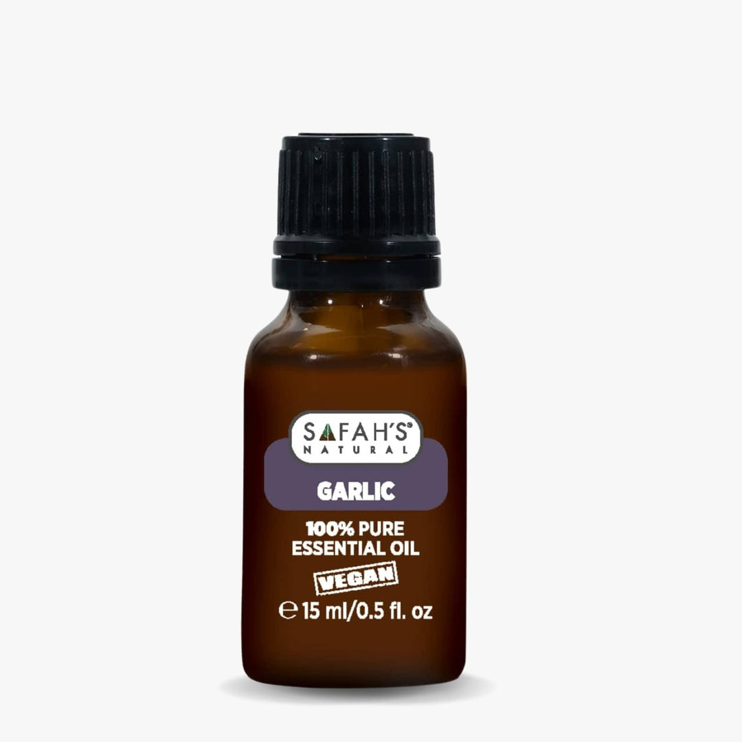 Safah's Natural Garlic essential oil bottle on a white background