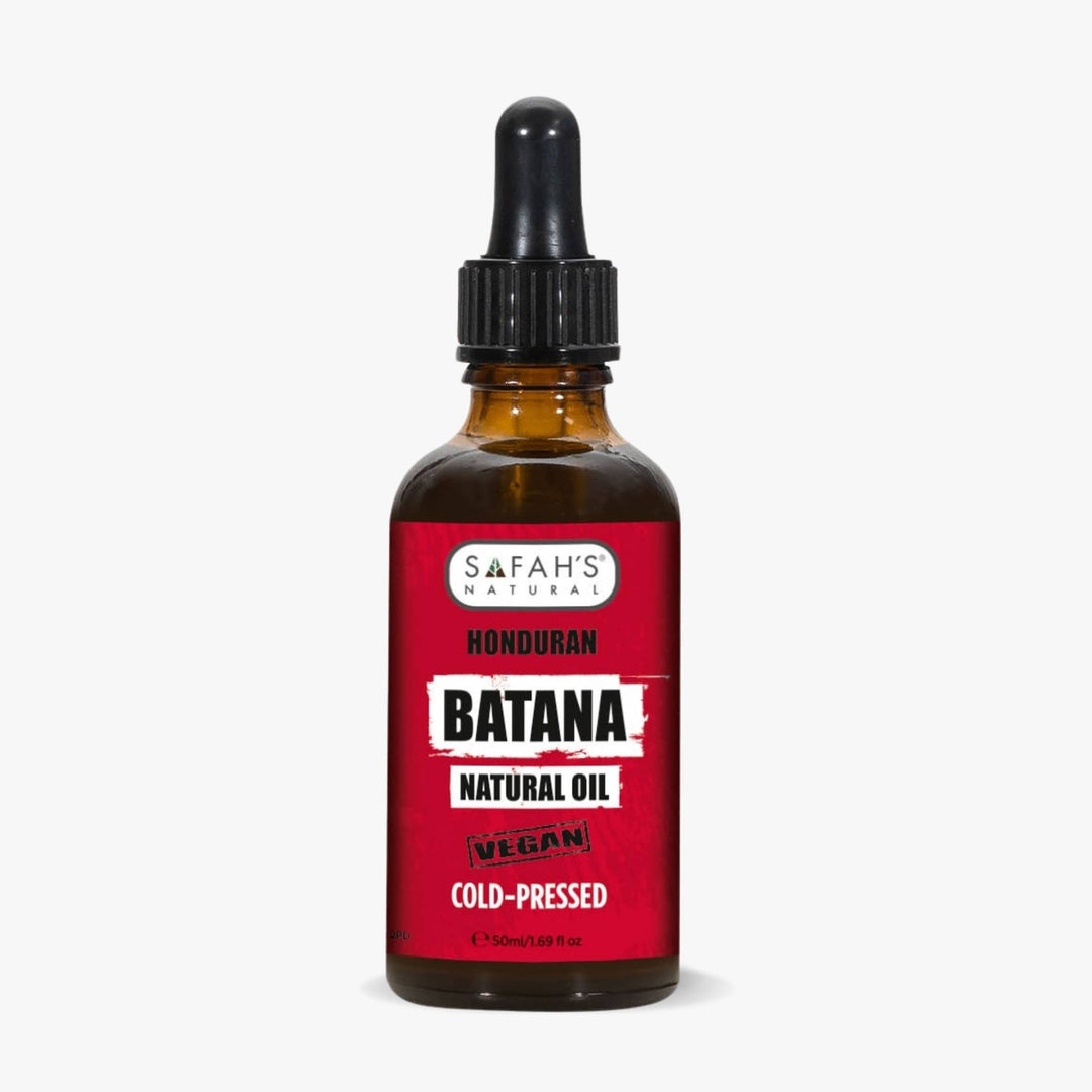 Safah's Batana natural oil bottle with red label on a white background