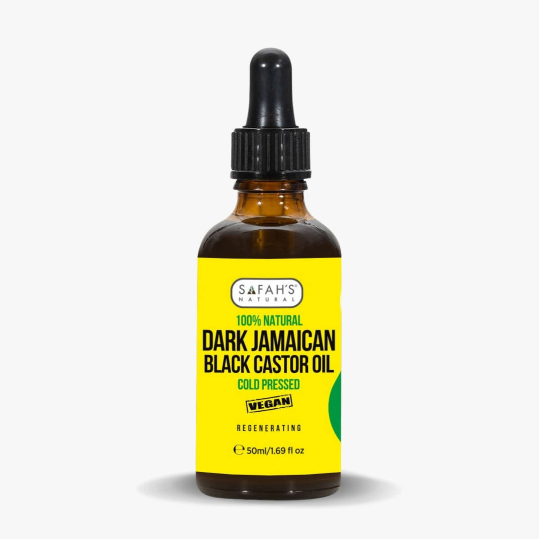 Safah's Naturals Dark Jamaican Black Castor Oil bottle with yellow label on a white background