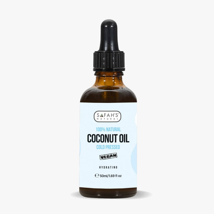 Bottle of Safa's Naturals coconut oil with a dropper on a white background