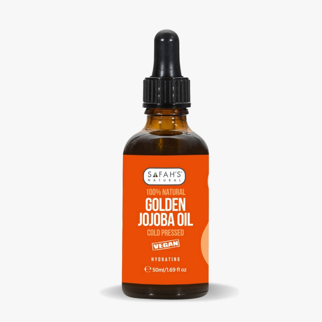 Safah's Golden Jojoba Oil bottle with orange label on a white background