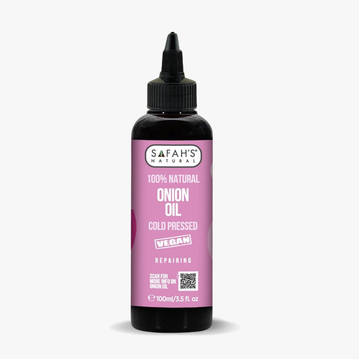 Bottle of Safah's Natural Onion Oil with pink label on white background