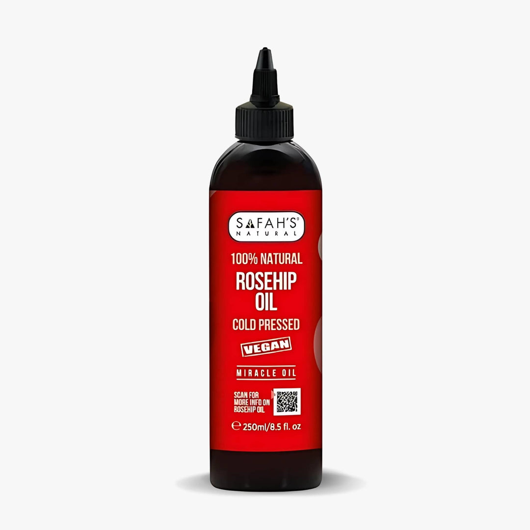 Safah's Rosehip Oil bottle with red label on a white background