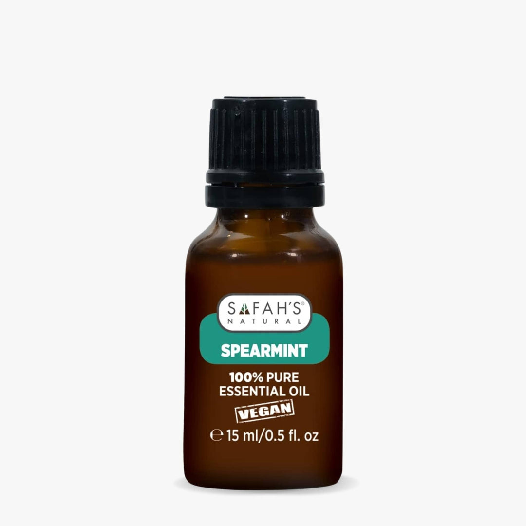 Safah's Naturals Spearmint essential oil bottle on a white background